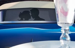 vintage car cutout prop with silhouette of adults kissing like drive in cinema