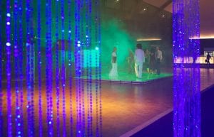 beaded curtains and light up dance floor with smoke machine