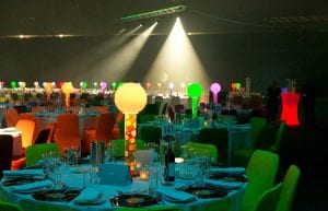 Room shot at Perth Convention Centre pavilion for gala dinner showing 1980s themed table centrepieces