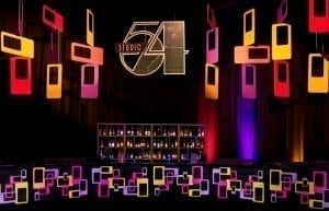 studio 54 themed disco bar with shleves, bottles, large signage and custom print bar