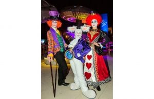 character performers for alice in wonderland theme party in costume. mad hatter, queen of hearts and the white rabbit
