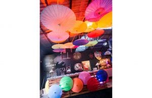 bright colourful hanging umbrellas vietnamese themed event