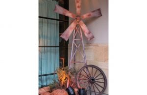 australiana outback themed event windmill fence posts and wagon wheel