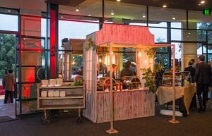 australian outback hut for food service with hanging edison globes