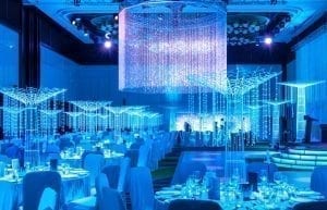 Winter Wonderland event theme with beaded chandelier, beaded curtains, crystal tree centrepieces, light up led staircase and chair covers for hire. Photo taken at Crown Towers Perth for Christmas Party.
