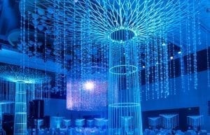 Winter Wonderland event theme with beaded chandelier, beaded curtains, floor standing crystal tree centrepieces and chair covers for hire. Photo taken at Crown Towers Perth for for Christmas Party.
