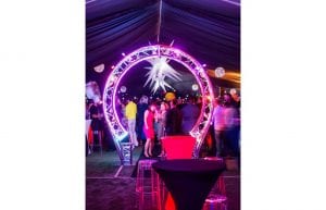 Space event theme with black drapes, giant inflatable stars, curved trussing entry feature, illuminated led hi bar furniture, lycra hi bar covers, coloured ghost stools and wicker ball lights for hire.