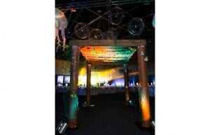 Under The Sea event theme with Jetty Entry feature, assorted fish underneath, aqua effect lighting, fishing nets, giant inflatable jellyfish, inflatable ball bubbles, jellyfish orb centrepieces and chair linen for hire.