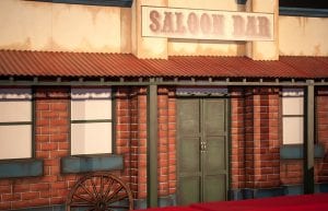 Wild West event styling theme with saloon bar prop , saloon doors, large wheel, for hire.