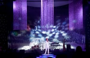 Winter Wonderland event theme with beaded chandelier, beaded curtains, winter wonderland backdrop and light up led staircase for hire.