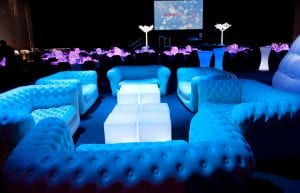 Winter Wonderland event theme with led light up trees, led light up furniture, inflatable chesterfield sofas, wicker ball centrepieces, and mirror centrepiece bases for hire.