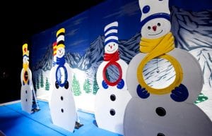 Winter Wonderland event theme with winter backdrop and cut out snowmen props for hire.